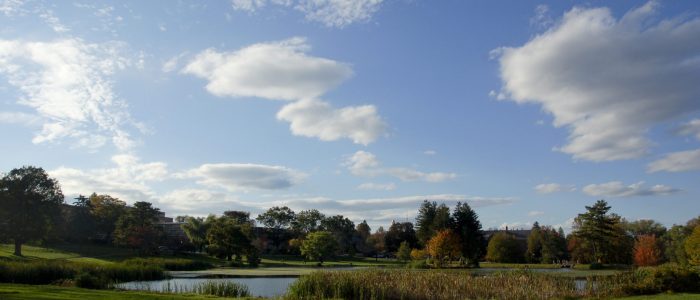 Mirror Lake under clouds on the UConn Campus.